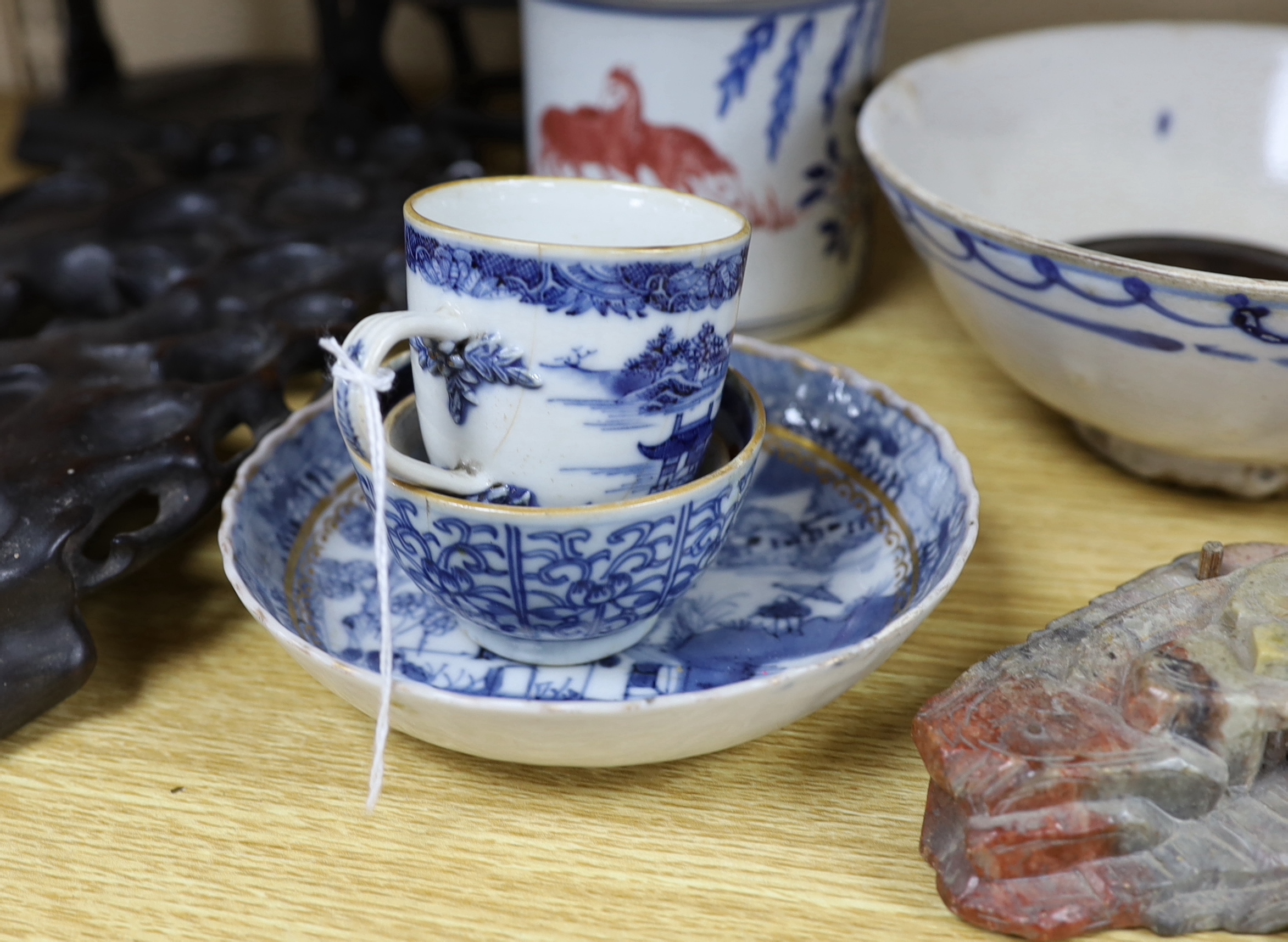 A collection of Chinese hardwood stands and a soapstone example, largest 29cm wide
